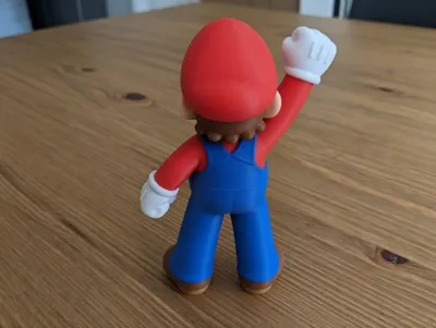 Super Mario Punho Erguido - Figura Nintendo